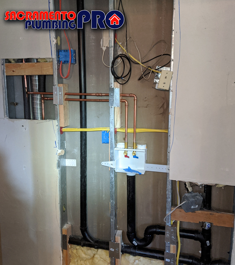 Expert team performing Full House Repiping in a Sacramento home, showcasing modern plumbing techniques and high-quality materials.