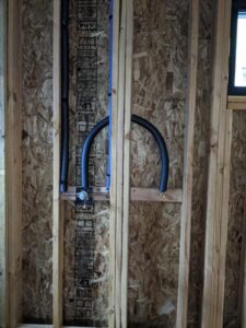In-wall plumbing system upgrade in a Sacramento residence, highlighting meticulous workmanship.