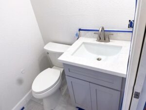 Compact bathroom plumbing installation in Orangevale, optimizing space with precision.